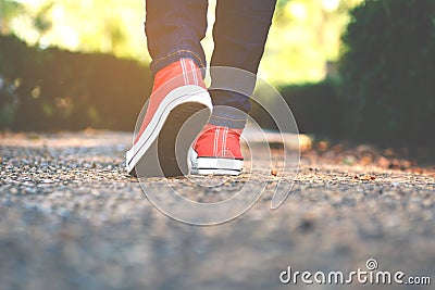 Feet women in the walking on the park Stock Photo