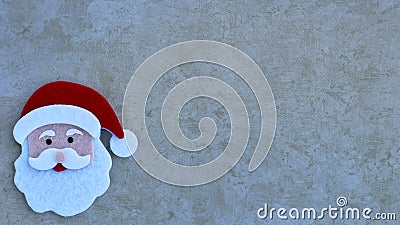 Santa Claus face on a tan background Stock Photo