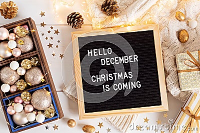 Felt letter board with text hello december, Christmas is coming and xmas decoration Stock Photo