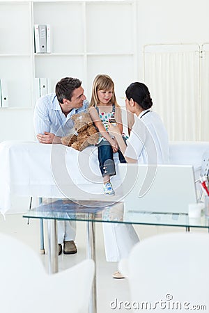 Femal doctor giving medecine to a patient Stock Photo