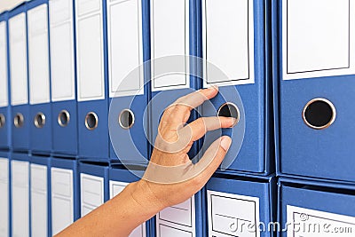 Female accountant archiving business documentation Stock Photo