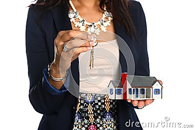 Female Agent Holding House and Keys Stock Photo