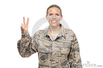 Female airman with peace sign Stock Photo