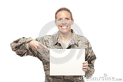 Female airman showing placard Stock Photo