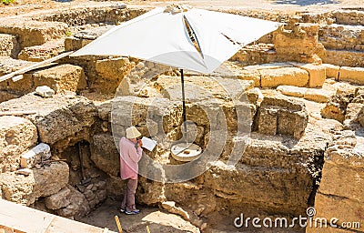 Female archaeologist. Old Town. Rhodes Island. Greece Editorial Stock Photo