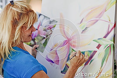 Female artist painting Stock Photo