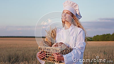 Female Baker Very Attractive with a Long Curly Hair Holding a Basket Full  of Break in the Middle of Wheat Field. Shot on Stock Footage - Video of  background, flour: 195281824