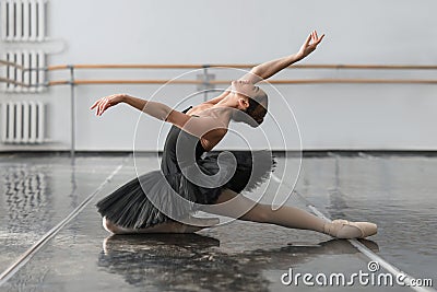 Female ballet dancer posin on rehearsal Stock Photo