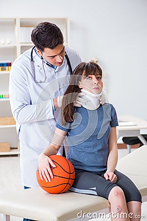 The female basketball player visiting doctor after injury Stock Photo