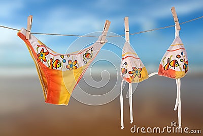 Female beach bikini drying in the sun Stock Photo