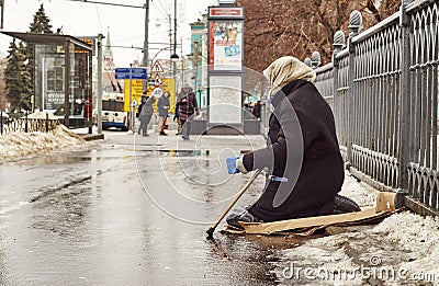 Female beggar on the street Editorial Stock Photo