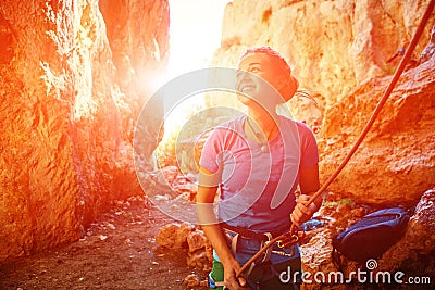 Female belayer with the rope Stock Photo