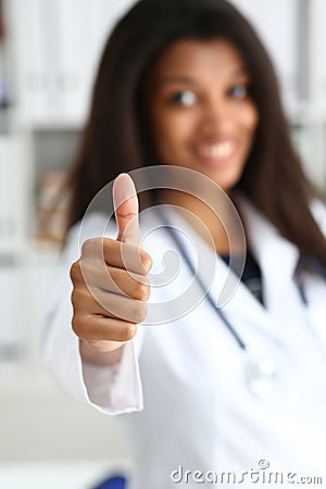 Female black doctor show OK or approval Stock Photo