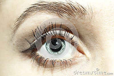 Female blue eyes with dilated pupils close Stock Photo