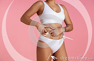 Female body, belly with drawing arrows. Fat lose, liposuction and cellulite removal concept. Good and fast metabolic Stock Photo