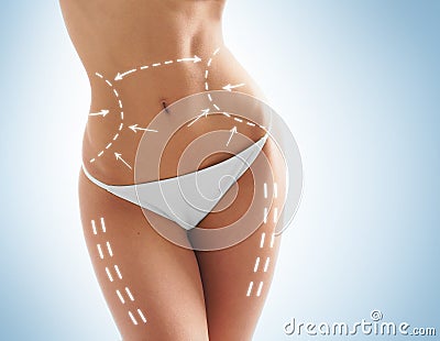 Female body with the drawing arrows on it Stock Photo