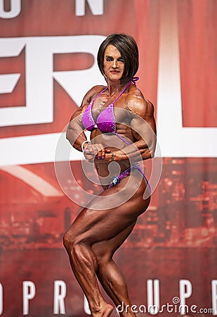 Female Bodybuilder Flexes at 2019 Toronto Pro Supershow Editorial Stock Photo