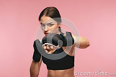 Female Boxer. Sportswoman Training In Boxing Bandages Stock Photo