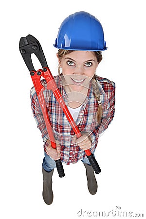 Female builder with boltcutters Stock Photo