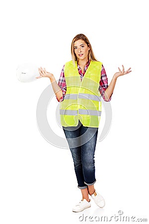 Female builder makind do not know sign Stock Photo