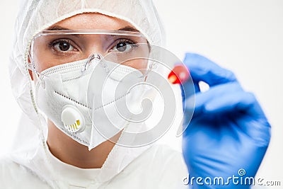 Female caucasian NHS front line medic holding swab collection stick Stock Photo