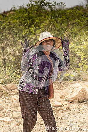 Female Charcoal gatherer near Siem Reap Editorial Stock Photo