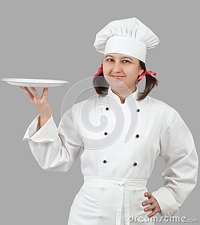 Female chef with a tray. Stock Photo