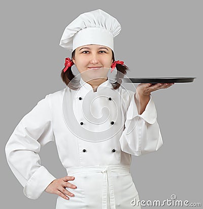 Female chef with a tray. Stock Photo