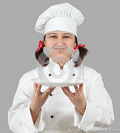 Female chef with a tray. Stock Photo