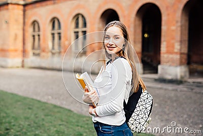 Female college student. Happy girl in european university for scholarship. Stock Photo