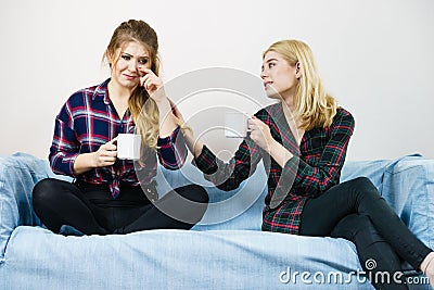 Female comforting her friend Stock Photo