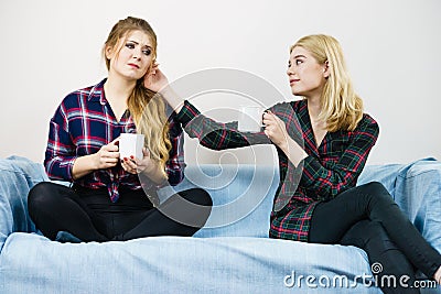 Female comforting her friend Stock Photo