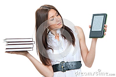 Female compare books and new wireless Stock Photo