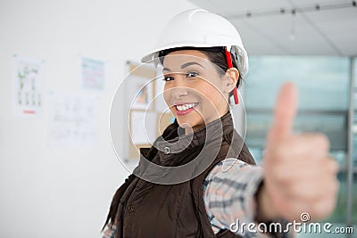 female construction worker with thumbs up Stock Photo