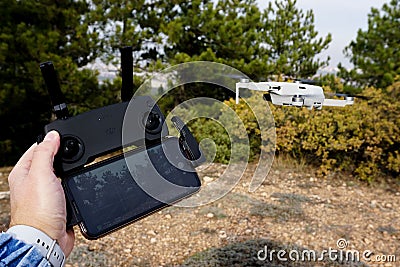 Female controlling a drone Editorial Stock Photo