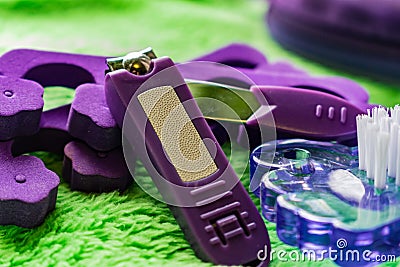 Female cosmetic set for pedicure toenails. Special handling tongs, pliers, foam brush face brush Stock Photo