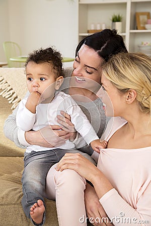 Female couple with baby son Stock Photo