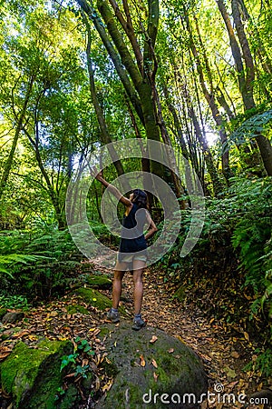 Female in Cubo de la Galga Natural Park on the southeast coast of the island of La Palma, Canary Isl Editorial Stock Photo