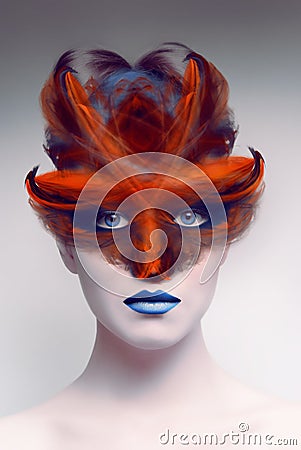 Female demon face with mask. Art concept. Stock Photo