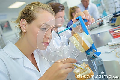 Female dental technician at work Stock Photo