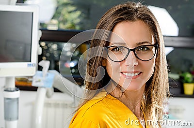 Female Dentist With Tools Stock Photo