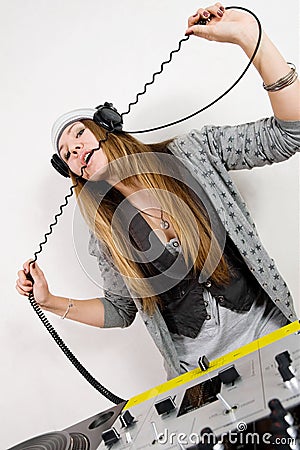 Female DJ at the turntables Stock Photo