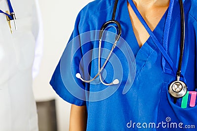 Female doctor in a blue robe with a stethoscope Stock Photo