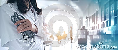 Female doctor in confident with stethoscope in hand on hospital Stock Photo
