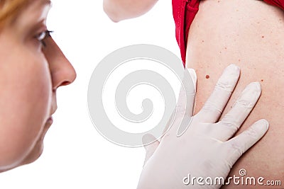 Female doctor examine skin Stock Photo