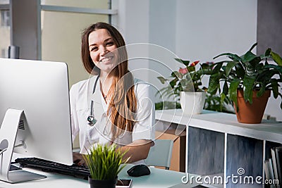 Female doctor giving medical prescriptions by internet. Stock Photo