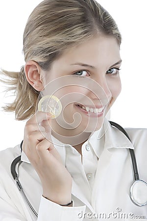 Female Doctor holding condoms Stock Photo