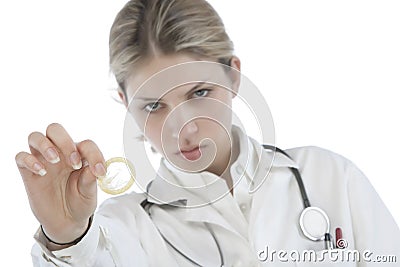 Female Doctor holding condoms Stock Photo