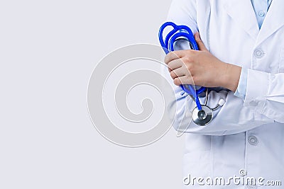 Female doctor portrait, young woman physican holding a stethoscope isolated on white background, close up, cropped view, copy Stock Photo