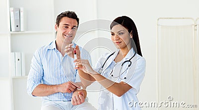 Female doctor preparing an injection Stock Photo